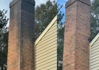 Side-by-side of a chimney before and after cleaning; left side is dirty, right side is clean and bright.