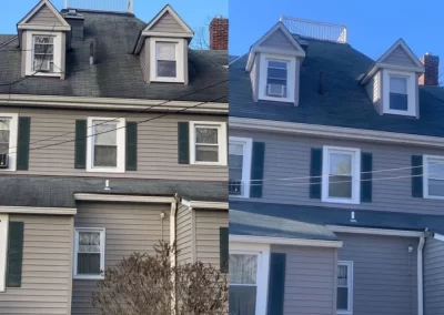 A two-story gray house with dormer windows and green shutters, shown from two slightly different angles.
