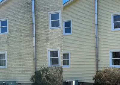 Side-by-side of a house: left side dirty siding, right side clean siding, both with blue sky above.